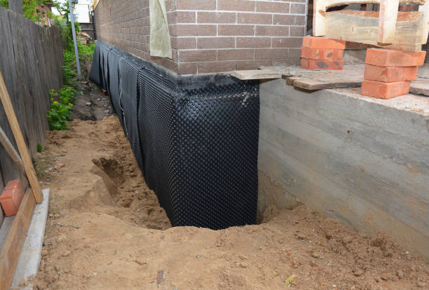 Happy homeowners after waterproofing job in Sun Prairie